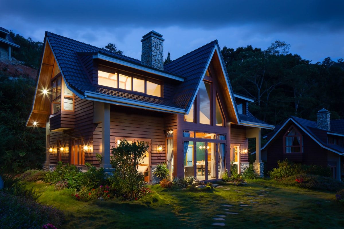 Luxury home glowing at twilight